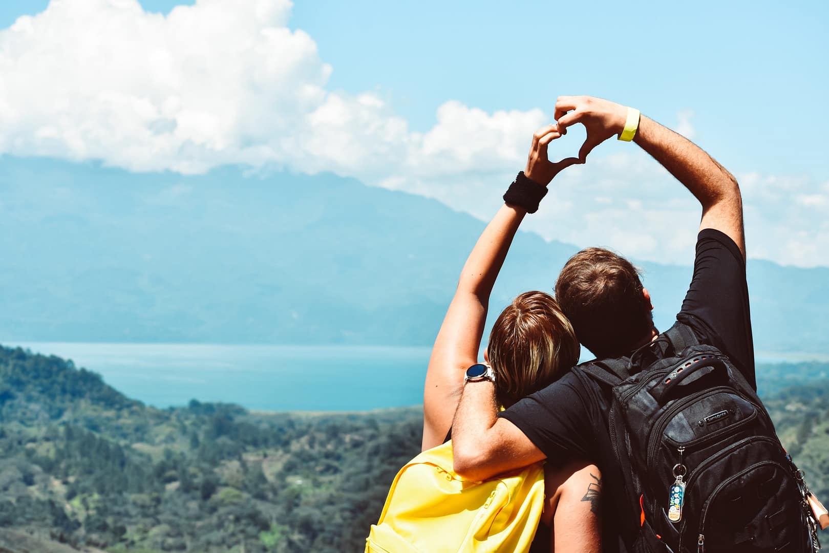 Hikers making a heart with their hands
