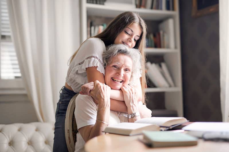 child hugging grandmother
